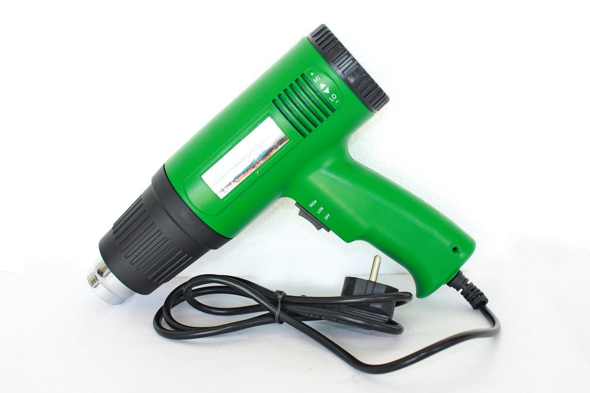 Heat gun for loosening window film adhesive