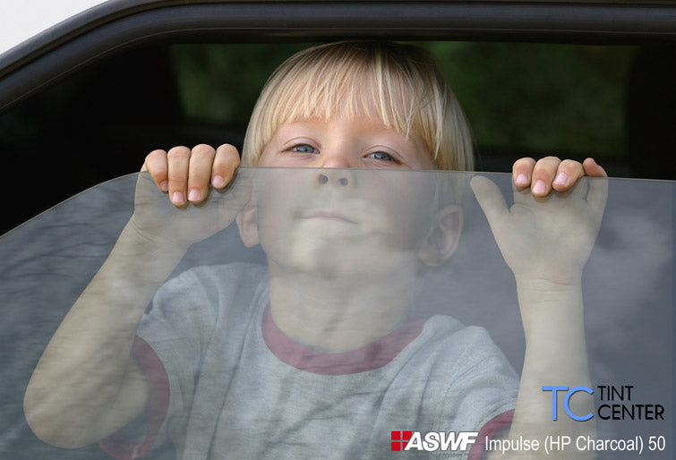 ASWF Impulse HP Charcoal automotive tint on a car window
