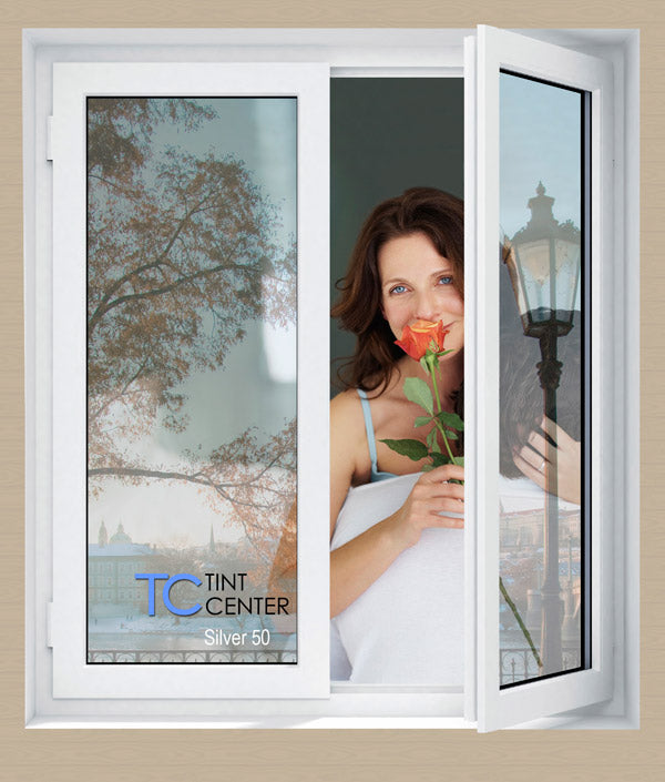 TintCenter Silver Reflective window film on a building window